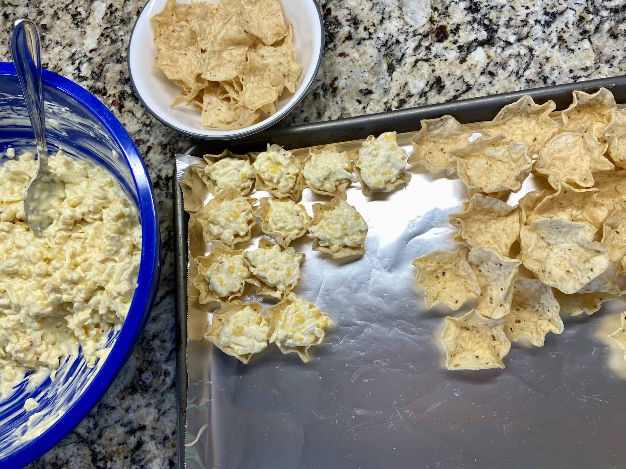 put the broken scoops and small pieces into a separate bowl to later dump back into their original bag. spoon a small amount of mixture into individual scoops